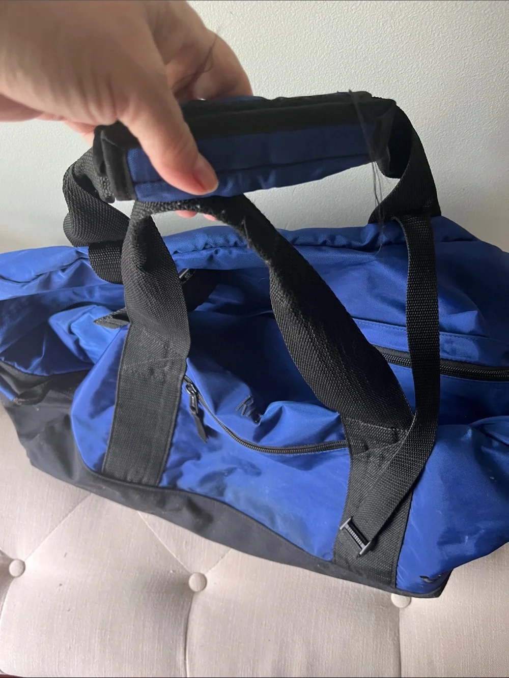 Blue and Black Duffel Bag one clip is broken. 10” x 20” x12”approximately